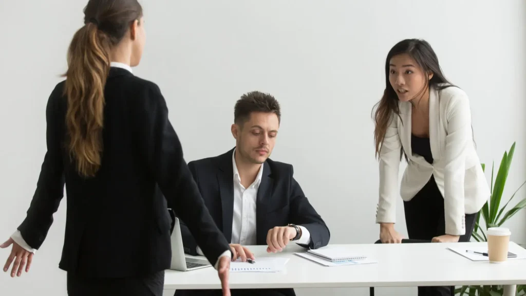 HR team discussing why candidates drop out late in the hiring process
