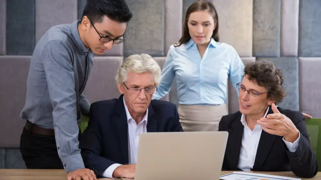 Executive leaders analyzing the financial impact of a bad leadership hire on business performance